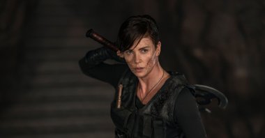 This image released by Netflix shows Charlize Theron in a scene from &quot;The Old Guard.&quot; (AP Photo)