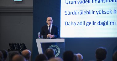 Treasury and Finance Minister Mehmet Şimşek delivers a speech during an event in Istanbul, Türkiye, May 29, 2024. (AA Photo)