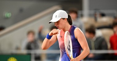 Iga Swiatek celebrates after beating Naomi Osaka during the French Open, Paris, France, May 30, 2024. (AA Photo)
