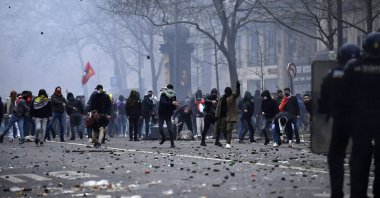PKK terrorist group supporters face riot police as clashes erupt, Paris, France, Dec. 24, 2022. (AFP Photo)