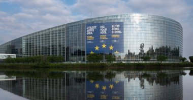 A giant poster announcing the upcoming European elections adorns the facade of the European Parliament building, Strasbourg, France, May 8, 2024. (AFP Photo)