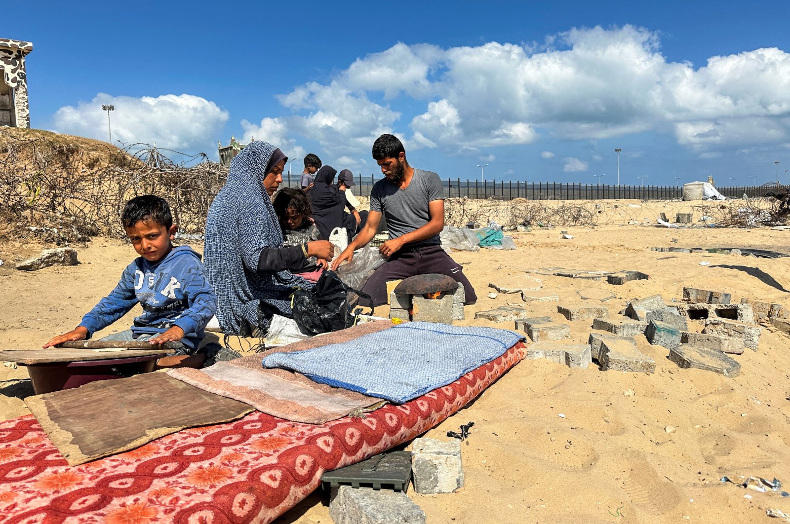 Displaced Palestinians from Al-Doaa family take shelter at the border with Egypt, during an Israeli military operation, in Rafah, southern Gaza Strip, Palestine, May 29, 2024. (Reuters Photo)