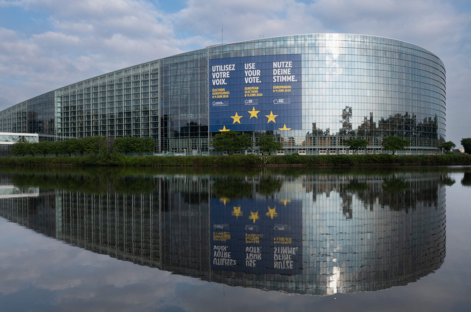 A giant poster announcing the upcoming European elections adorns the facade of the European Parliament building, Strasbourg, France, May 8, 2024. (AFP Photo)