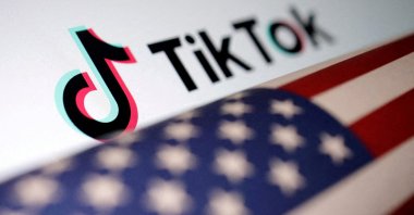 The U.S. flag is placed on a TikTok logo in this illustration taken March 20, 2024. (Reuters Photo)
