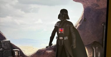 The artwork depicts a space theme while featuring a character holding a weapon, Cappadocia, Türkiye, May 26, 2024. (Photo by Funda Karayel)