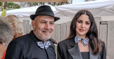 Palestinian film director Rashid Masharawi and Tunisian actor Dorra Zarrouk pose at an event to support Gaza to draw attention to the situation in Gaza and Israel, Cannes, France, May 20, 2024. (AFP Photo)