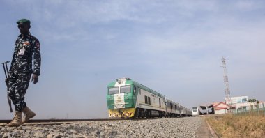 A police officer stands on guard at Rigasa railway station during a test run/planned resumption of the Abuja-Kaduna train services, Nigeria, Nov. 27, 2022. (Reuters Photo)
