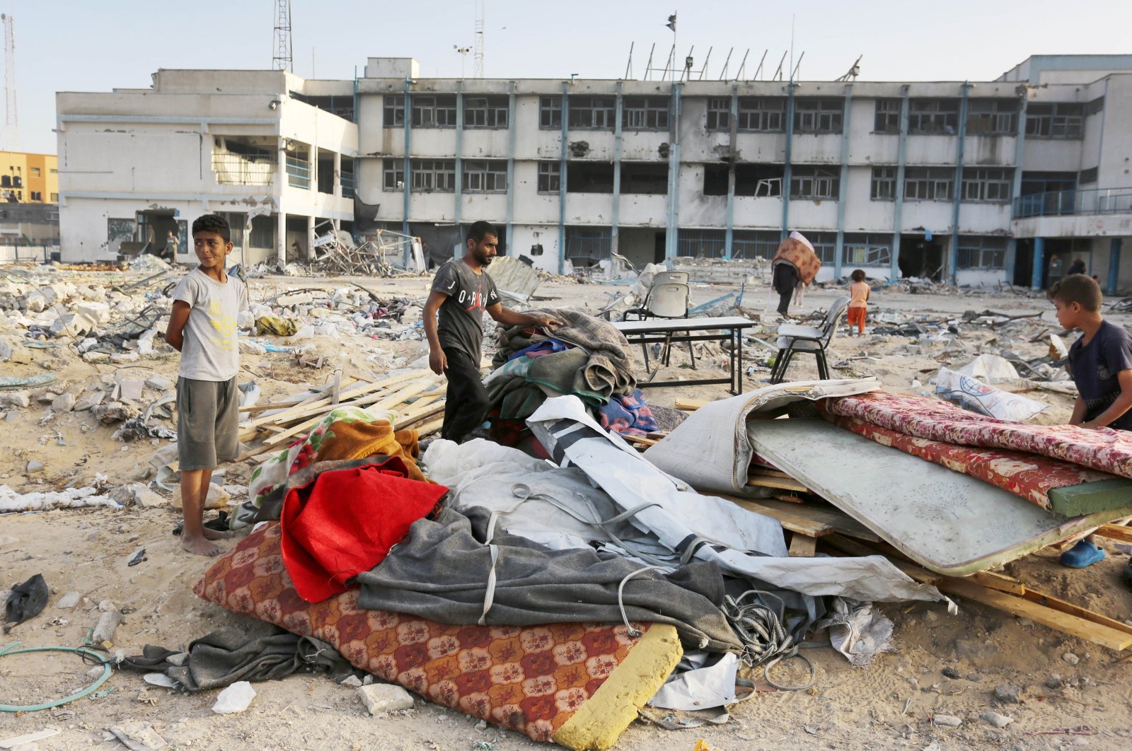 Displaced Gazan Palestinians salvage shelter following Israeli attacks in Khan Younis, Gaza Strip, Palestine, May 9, 2024. (AA Photo)