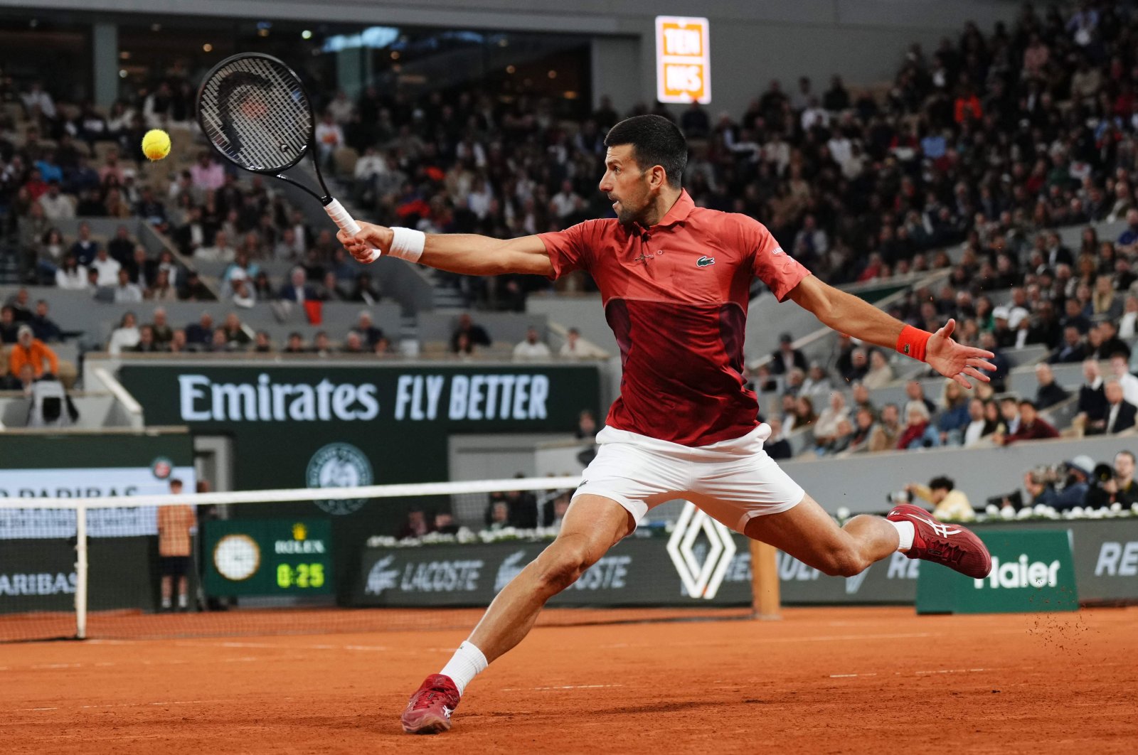 Serbia&#039;s Novak Djokovic plays a backhand return to Spain&#039;s Roberto Carballes Baena during their singles match on Day 5 of the French Open at Roland Garros, Paris, France, May 30, 2024. (AFP Photo)