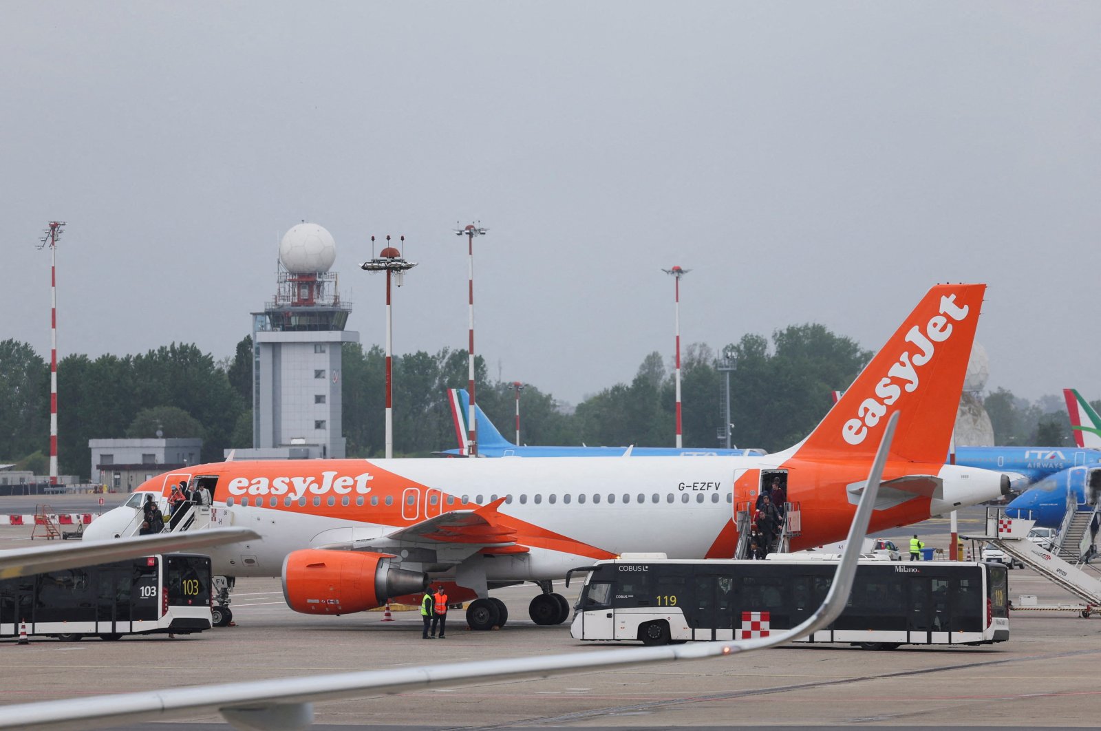 An easyJet airplane is towed at Linate Airport, Milan, Italy, May 2, 2024. (Reuters Photo)