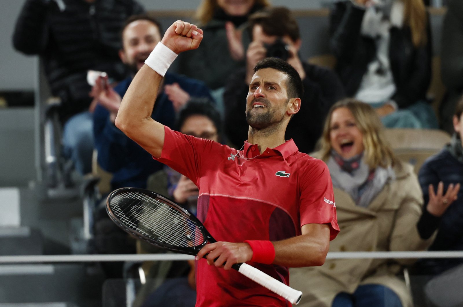 Djokovic pulls victory from jaws of defeat in French Open thriller