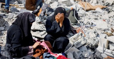 Palestinian sisters Samar and Sahar react as they search for their missing mother Amira al-Breim at the rubble of a house hit in an Israeli strike, in Khan Younis, southern Gaza Strip, Palestine, June 3, 2024. (Reuters Photo)