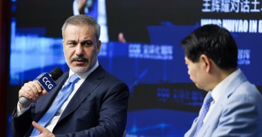 Foreign Minister Hakan Fidan (L) speaks at an event at the Center for China and Globalization, Beijing, China, June 3, 2024. (IHA Photo)