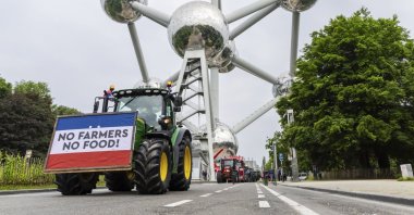 Farmers with their tractors gather around the Atomium, Brussels, Belgium, June 4, 2024.  (AP Photo)