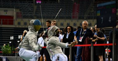 Türkiye's Nisanur Erbil (R) in action with Ukraine's Olga Kharlan during women's saber individual at Tauron Arena for the 3rd European Games, Krakow, Poland, June 27, 2023. (Getty Images Photo)