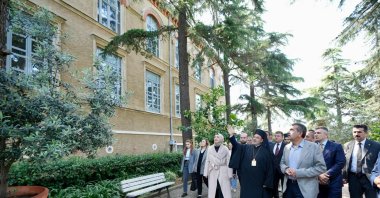 Minister of National Education (front) is accompanied on a tour of the building of a high school where the Halki seminary is also located, Istanbul, Türkiye, May 28, 2024. (AA Photo)