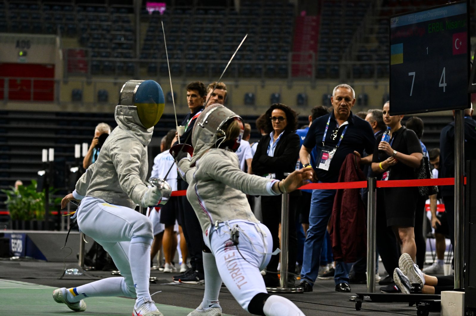 Türkiye&#039;s Nisanur Erbil (R) in action with Ukraine&#039;s Olga Kharlan during women&#039;s saber individual at Tauron Arena for the 3rd European Games, Krakow, Poland, June 27, 2023. (Getty Images Photo)