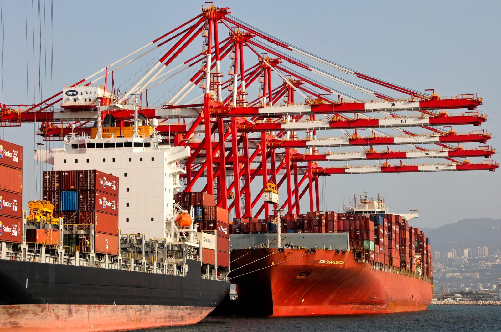 Ships are seen docked at the SIPG Bayport Terminal seaport in Haifa, Israel, May 21, 2024. (AFP Photo)