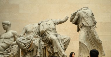 Visitors to the British Museum walk around a selection of items from the collection of ancient Greek sculptures known as the Elgin Marbles, London, U.K., Aug. 23, 2023. (Getty Images Photo)