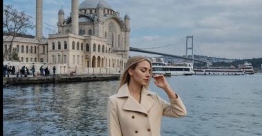 Asena stands with the view of Ortaköy Mosque and the Bosphorus Bridge, Istanbul, Türkiye, May 31, 2024. (Instagram / @aisenailik)