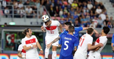 Türkiye's Kaan Ayhan (C) heads the ball during the international friendly match against Italy at the Renato Dall'Ara Stadium, Bologna, Italy, June 4, 2024. (IHA Photo)