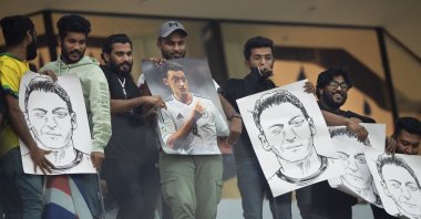 Mesut Ozil fans hold signs during the FIFA World Cup Qatar 2022 Group E match between Costa Rica and Germany at Al-Bayt Stadium, Al Khor, Qatar, Dec. 1, 2022. (Getty Images Photo)