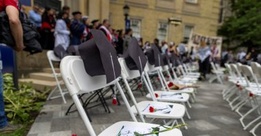 View of empty chairs as pro-Palestinian protesters and their supporters hold a graduation ceremony in honor of students killed and injured by Israeli attacks in Gaza, near the encampment at the University of Toronto on their first day of convocation in Toronto, Ontario, Canada, June 3, 2024. (Reuters Photo)