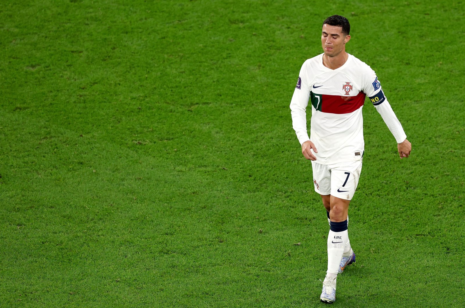 Portugal&#039;s Cristiano Ronaldo walks off the pitch after the team&#039;s defeat during the FIFA World Cup Qatar 2022 quarter final match against Morocco at Al Thumama Stadium, Doha, Qatar, Dec. 10, 2022. (Getty Images Photo)