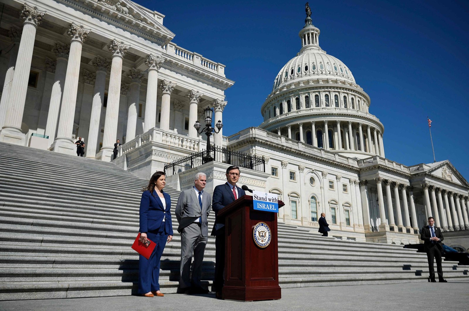 Speaker of the House Mike Johnson (R-LA) calls on the Senate to take up the Israel Security Assistance Support Act during a news conference with Majority Whip Tom Emmer (R-MN) and Rep. Elise Stefanik (R-NY) (L) on the East Front of the U.S. Capitol, May 16, 2024. (AFP File Photo)