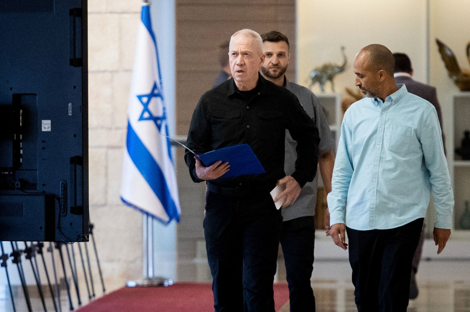 Israeli Defense Minister Yoav Gallant (L) walks at the Israeli parliament, the Knesset, in Jerusalem on May 20, 2024. (AFP Photo)