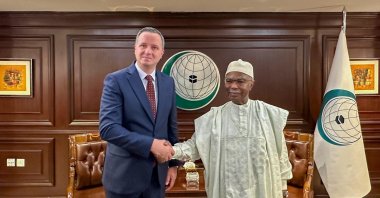TİKA President Serkan Kayalar (L) and OIC Secretary General Hussein Ibrahim Taha (R) at a ceremony held at the Organisation of Islamic Cooperation (OIC) headquarters in Jeddah, Saudi Arabia, June 5, 2024. (AA Photo)