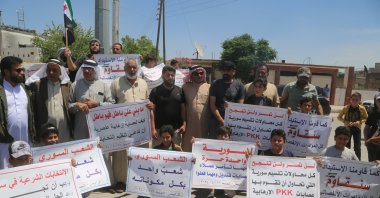 People stage a protest against the PKK/YPG&#039;s &quot;elections&quot; in Tal Abyad, Syria, May 31, 2024. (AA Photo)