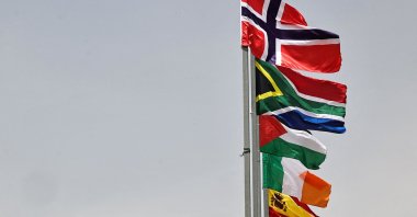 The flags of (from top) Norway, South Africa, Palestine, Ireland and Spain, are raised at an entrance of Ramallah city in the occupied West Bank, Palestine, May 28, 2024. (AFP Photo)