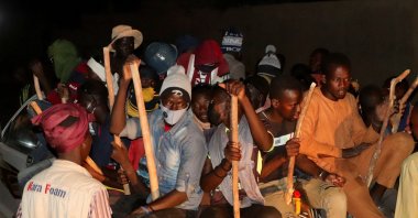 Migrants sit in the back of a truck, as they prepare to travel to Libya, Agadez, Niger, April 23, 2024. (Reuters Photo)