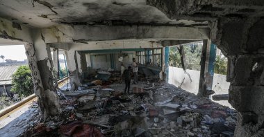 Palestinians inspect a destroyed UNRWA school following an Israeli air strike in Al Nusairat refugee camp, Gaza Strip, Palestine, June 6, 2024. (EPA Photo)