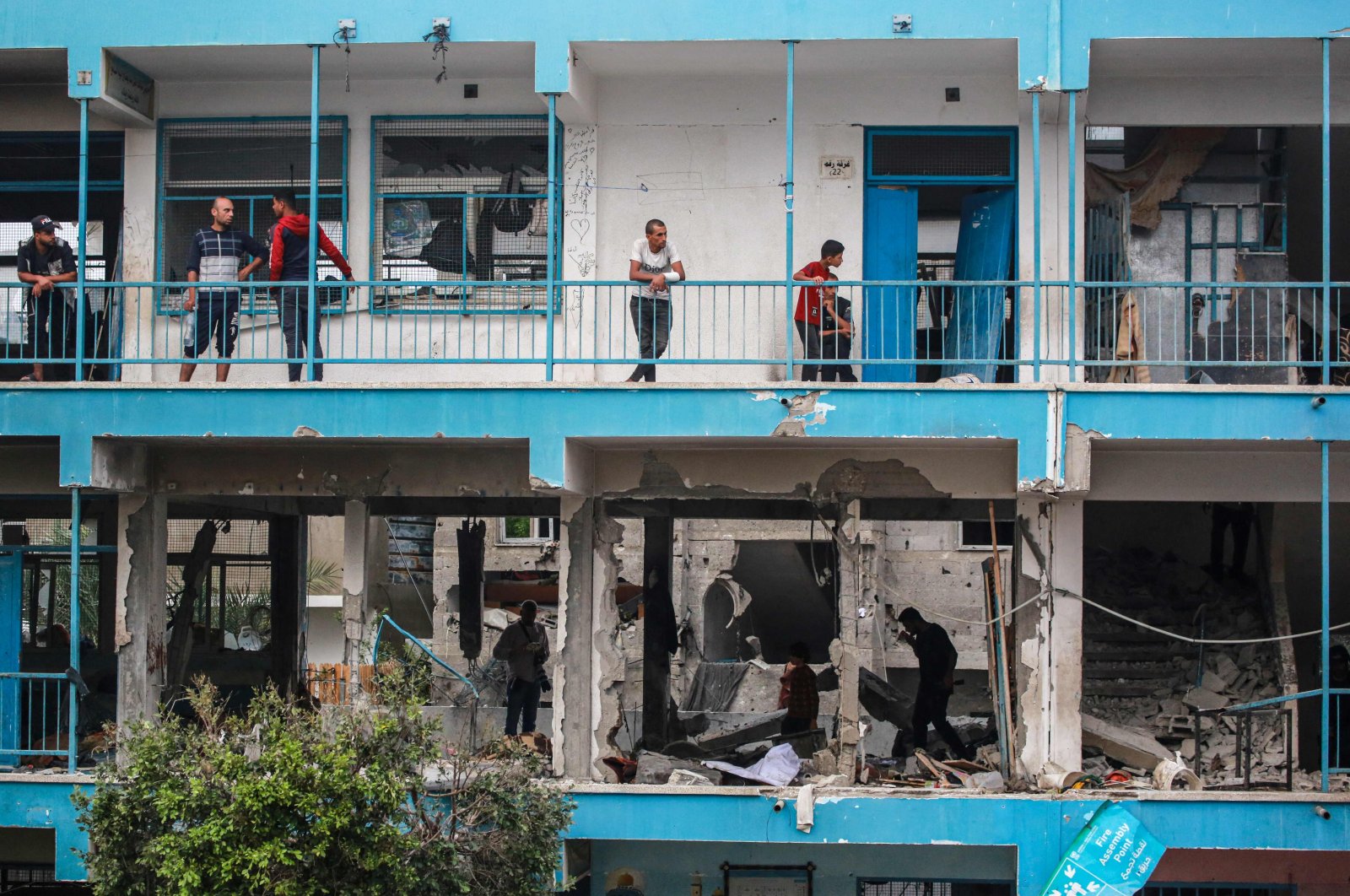 Palestinians check a U.N.-school housing displacing people that was hit during Israeli bombardment in Nuseirat, in the central Gaza Strip, June 6, 2024. (AFP Photo)