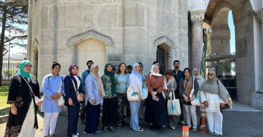The London YEE art students and future calligraphers pose near a historic site, Istanbul, Türkiye, June 8, 2024. (DHA Photo)