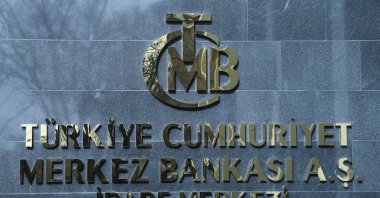 A logo of the Central Bank of the Republic of Türkiye (CBRT) is pictured at the entrance to its headquarters, Ankara, Türkiye, Feb. 8, 2024. (Reuters Photo)