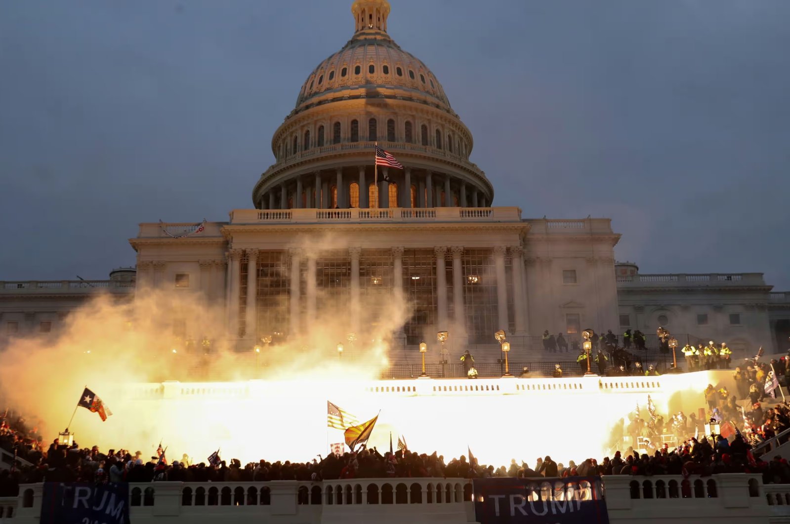 An explosion caused by a police munition is seen while supporters of then-President Donald Trump riot in front of the U.S. Capitol Building in Washington, U.S., Jan. 6, 2021. (Reuters File Photo)