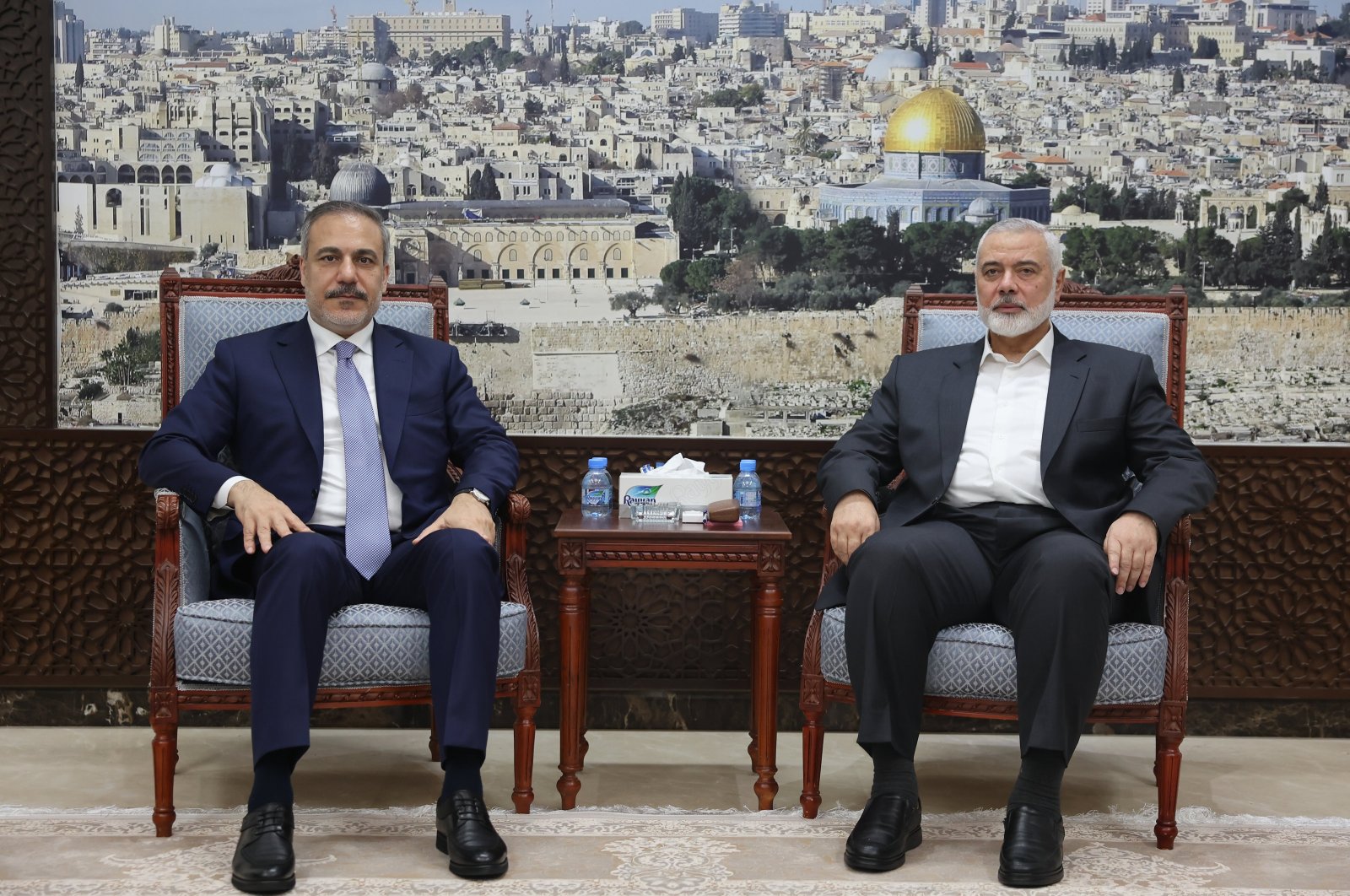 Foreign Minister Hakan Fidan (L) poses with Ismail Haniyeh of Hamas, in Doha, Qatar, June 9, 2024. (AA Photo) 