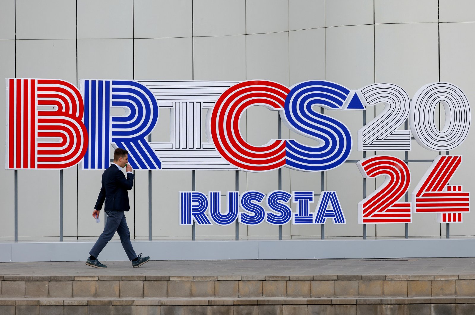 A man walks outside a venue, which will host a meeting of foreign ministers of the BRICS group of nations, in Nizhny Novgorod, Russia, June 9, 2024. (Reuters Photo) 