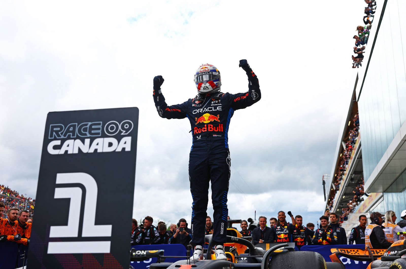 Oracle Red Bull Racing&#039;s Dutch driver Max Verstappen celebrates in parc ferme during the F1 Grand Prix of Canada at Circuit Gilles Villeneuve, Montreal, Quebec, Canada, June 09, 2024. (AFP Photo)