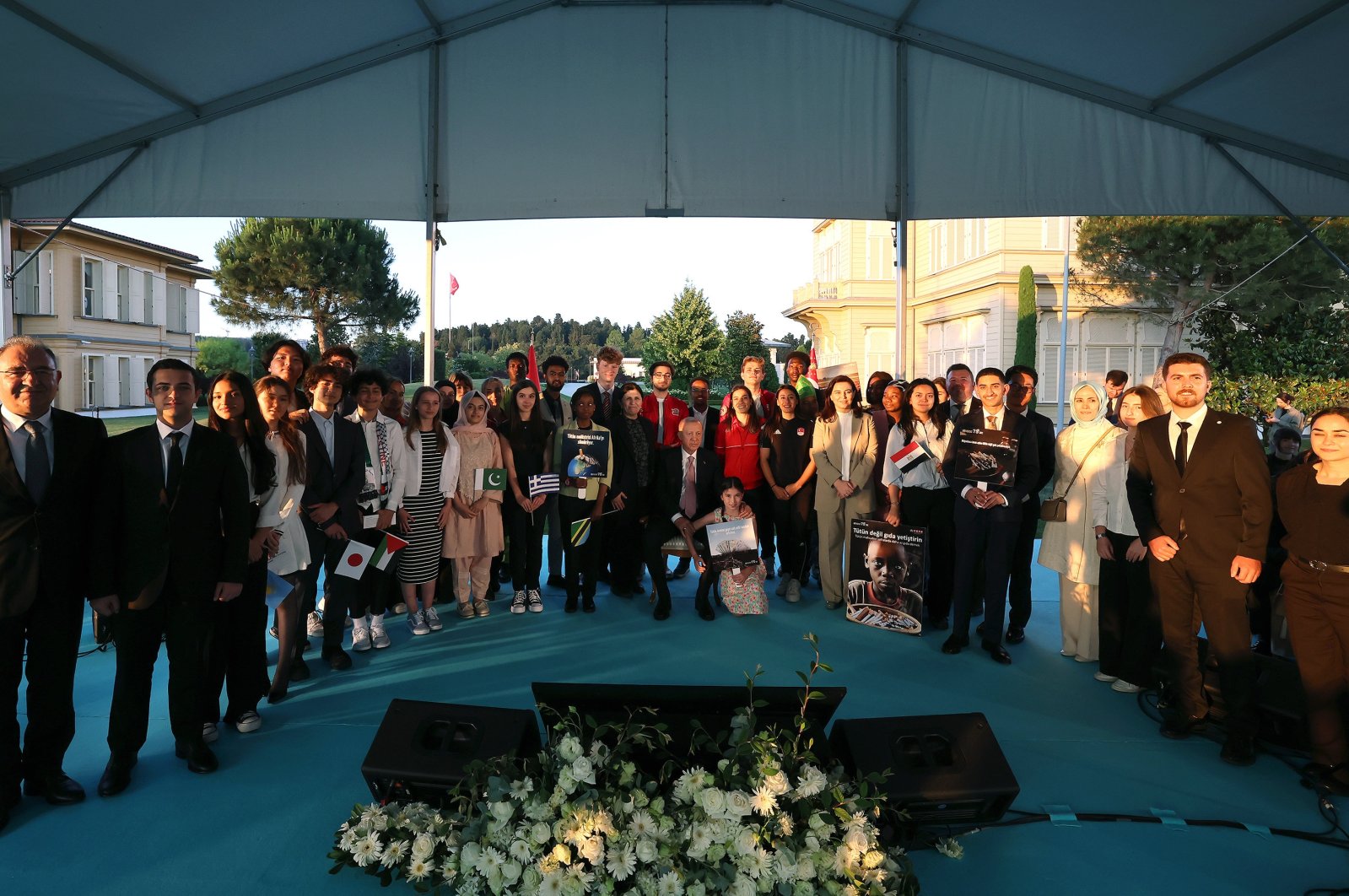 President Recep Tayyip Erdoğan meets with athletes and youth from various countries at Vahdettin Mansion to discuss the dangers of tobacco and environmental issues, Istanbul, Türkiye, June 9, 2024. (AA Photo)