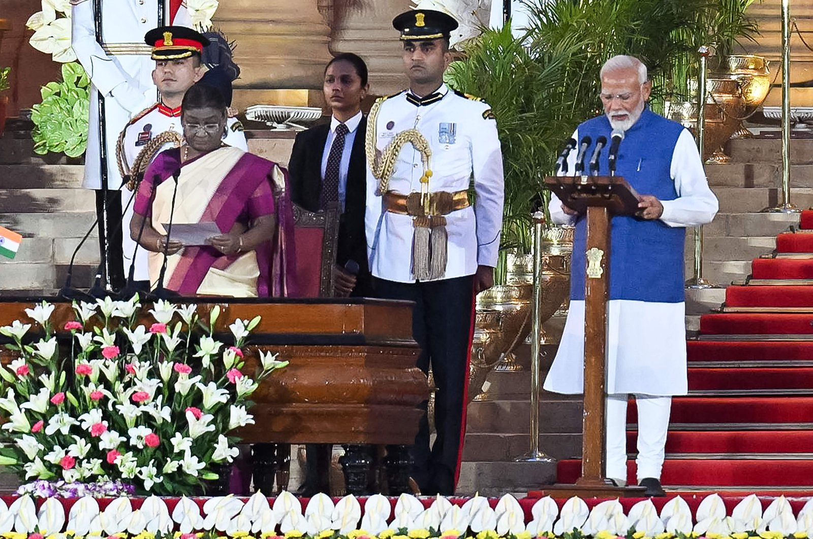 India’s Bharatiya Janata Party (BJP) leader, Narendra Modi (R) takes the oath of office for a third term as the country&#039;s Prime Minister during the oath-taking ceremony administered by President Droupadi Murmu (2L) at presidential palace Rashtrapati Bhavan in New Delhi, India, June 9, 2024. (AFP Photo)