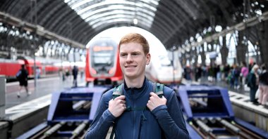 Lasse Stolley, who has been living on German trains since August 2022, poses for a photo at the main railway station in Frankfurt am Main, western Germany, May 29, 2024. (AFP Photo)