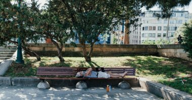 A man rests in a park in Istanbul, Türkiye, June 5, 2024. (Getty Images Photo)