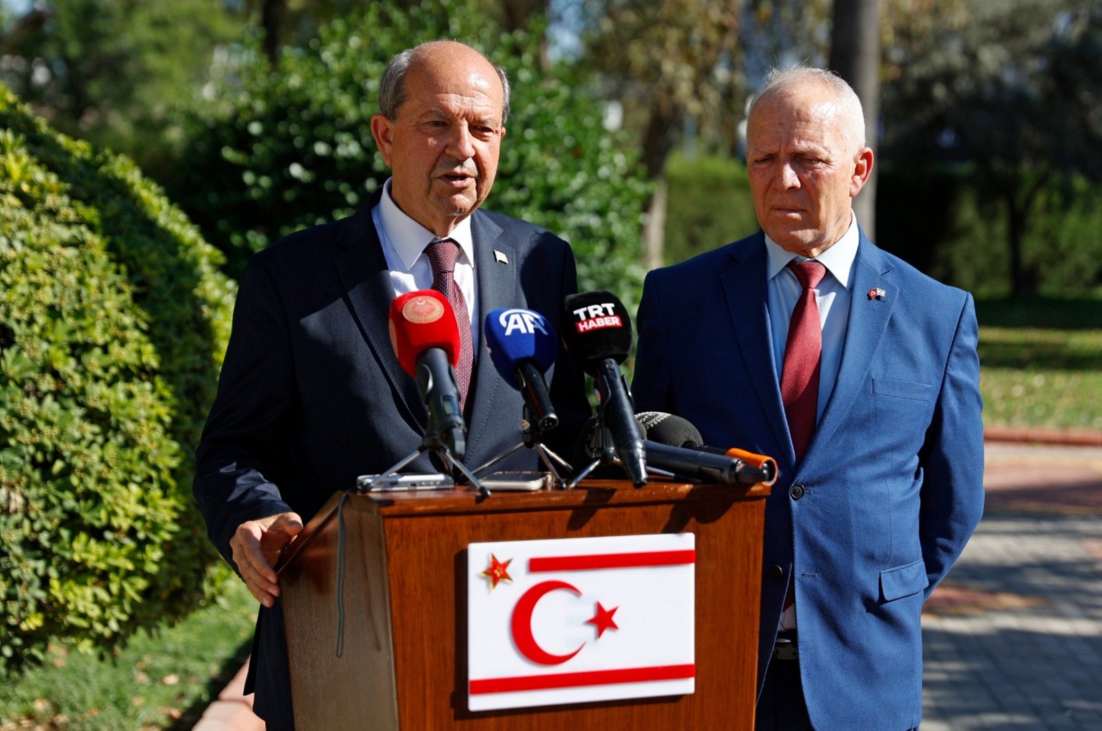 President Ersin Tatar (L) talks to reporters after a parliamentary session on the Cyprus issue in Lefkoşa (Nicosia), Turkish Republic of Northern Cyprus (TRNC), June 10, 2024. (AA Photo)