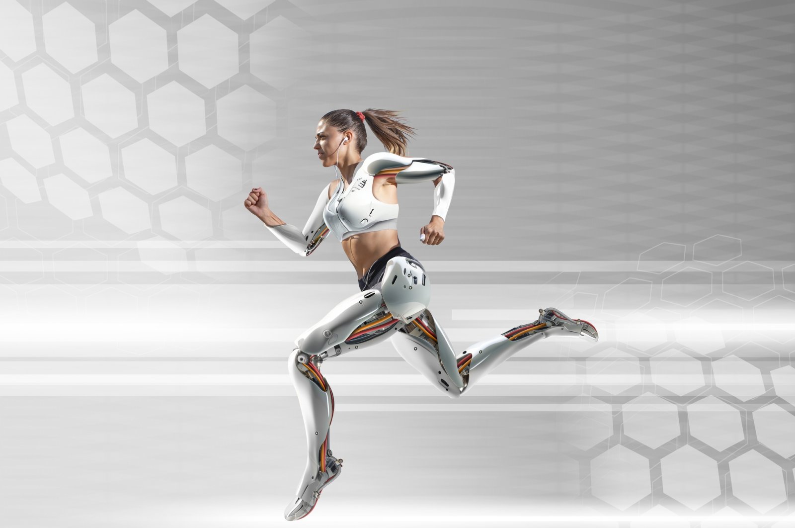 A female cyborg runs near a tech background. (Getty Images Photo)