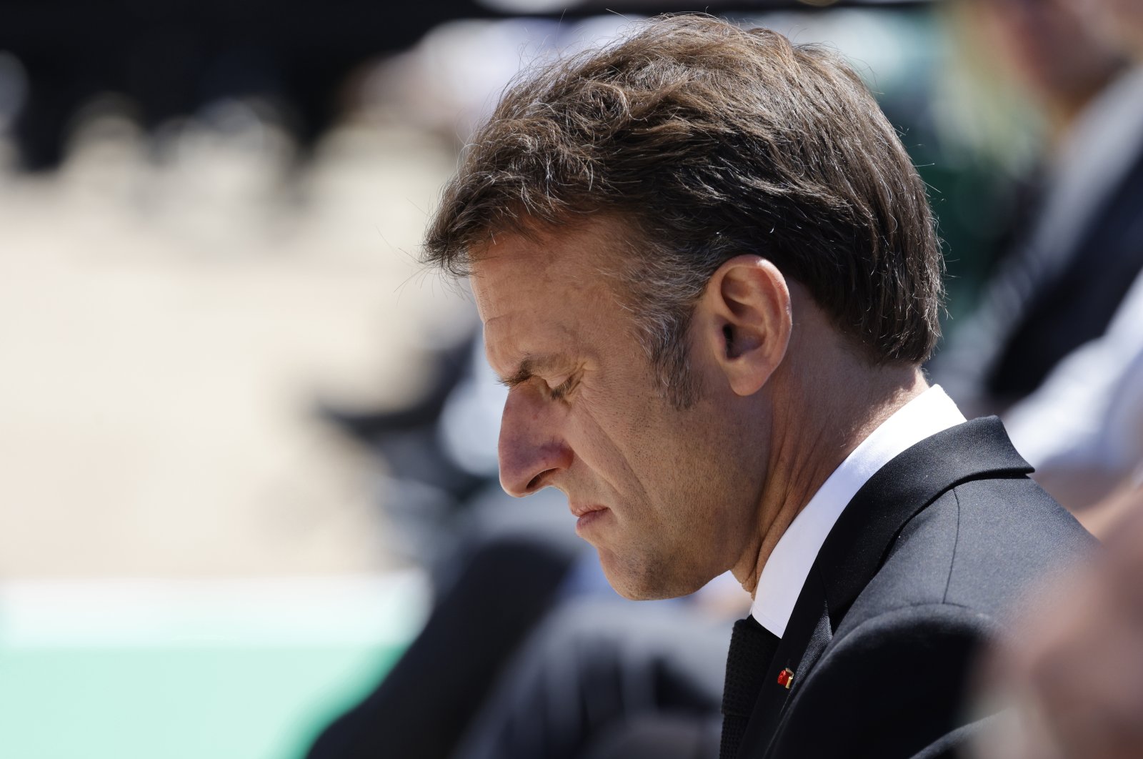 French President Emmanuel Macron attends a WWII in Oradour-sur-Glane, a day after he called snap legislative elections, saying he could not ignore the new political reality after his pro-European party was handed a chastening defeat and projected to garner less than half the support of Marine Le Pen&#039;s National Rally,  Oradour-sur-Glane, southwestern France, June 10, 2024. (AP Photo)