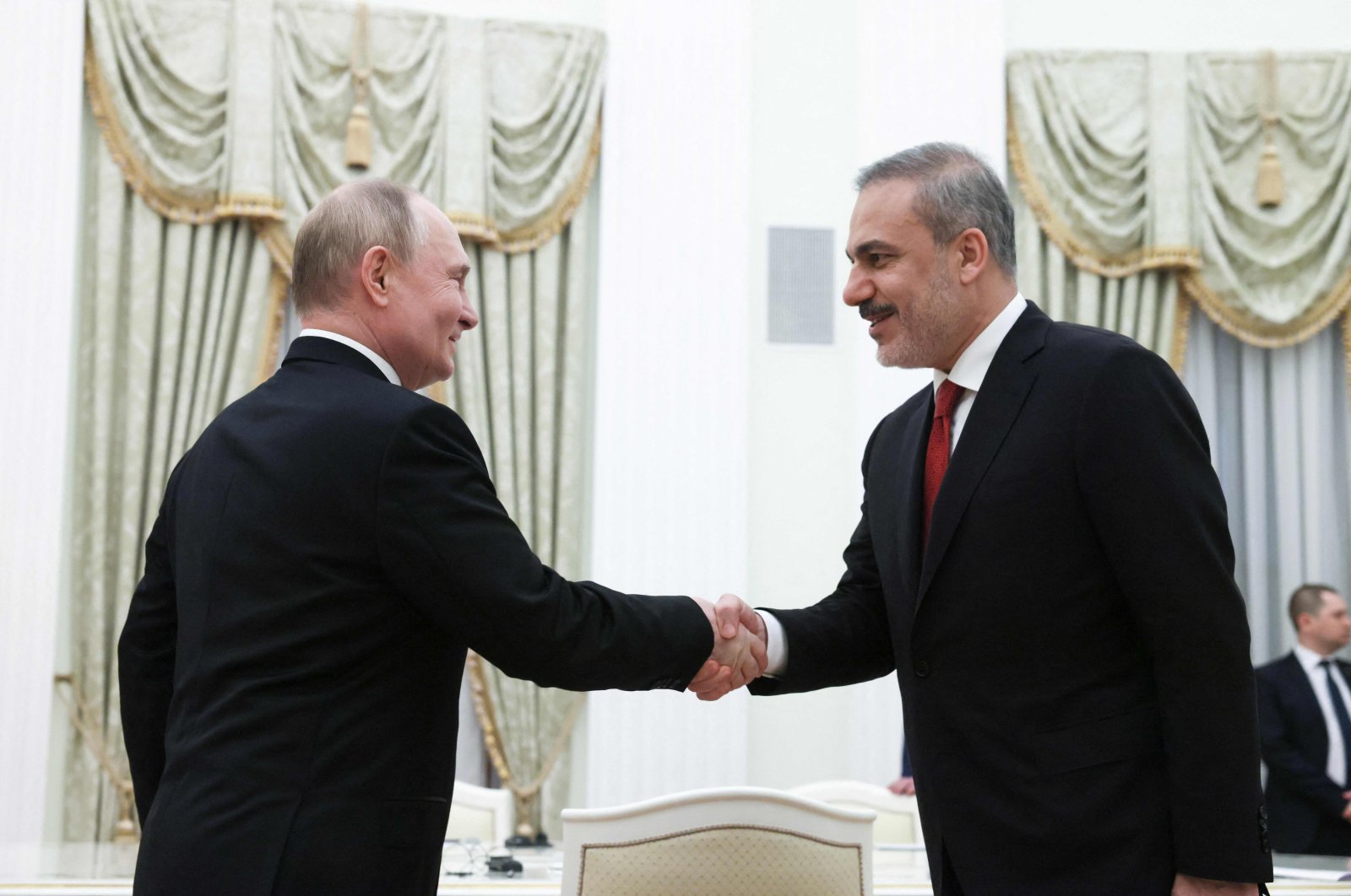 In this pool photograph distributed by Russian state agency Sputnik, Russia&#039;s President Vladimir Putin attends a meeting with Foreign Minister Hakan Fidan (R) in Moscow on June 11, 2024. (AFP Photo)